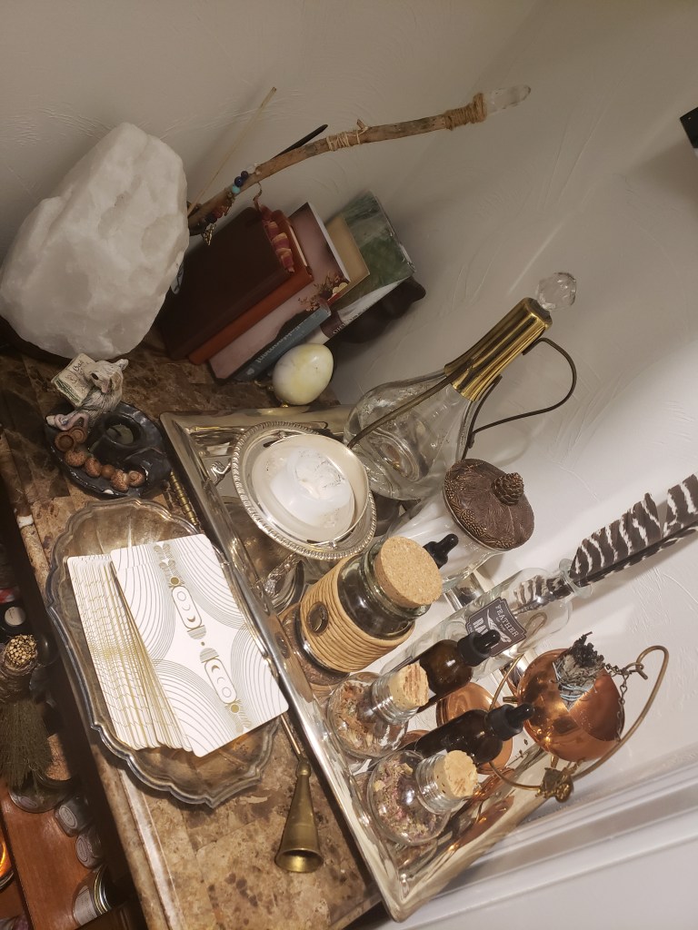 witch altar with witch items and other witchy tools decor.
